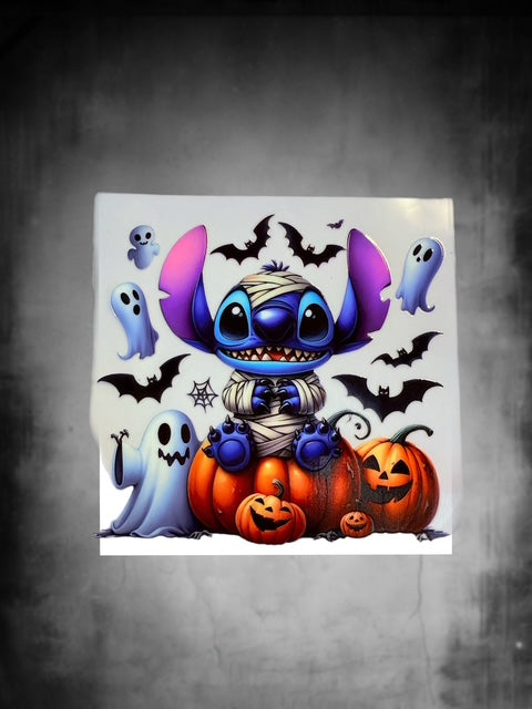 583. Mummy Blue Alien Sitting on Pumpkin Decal